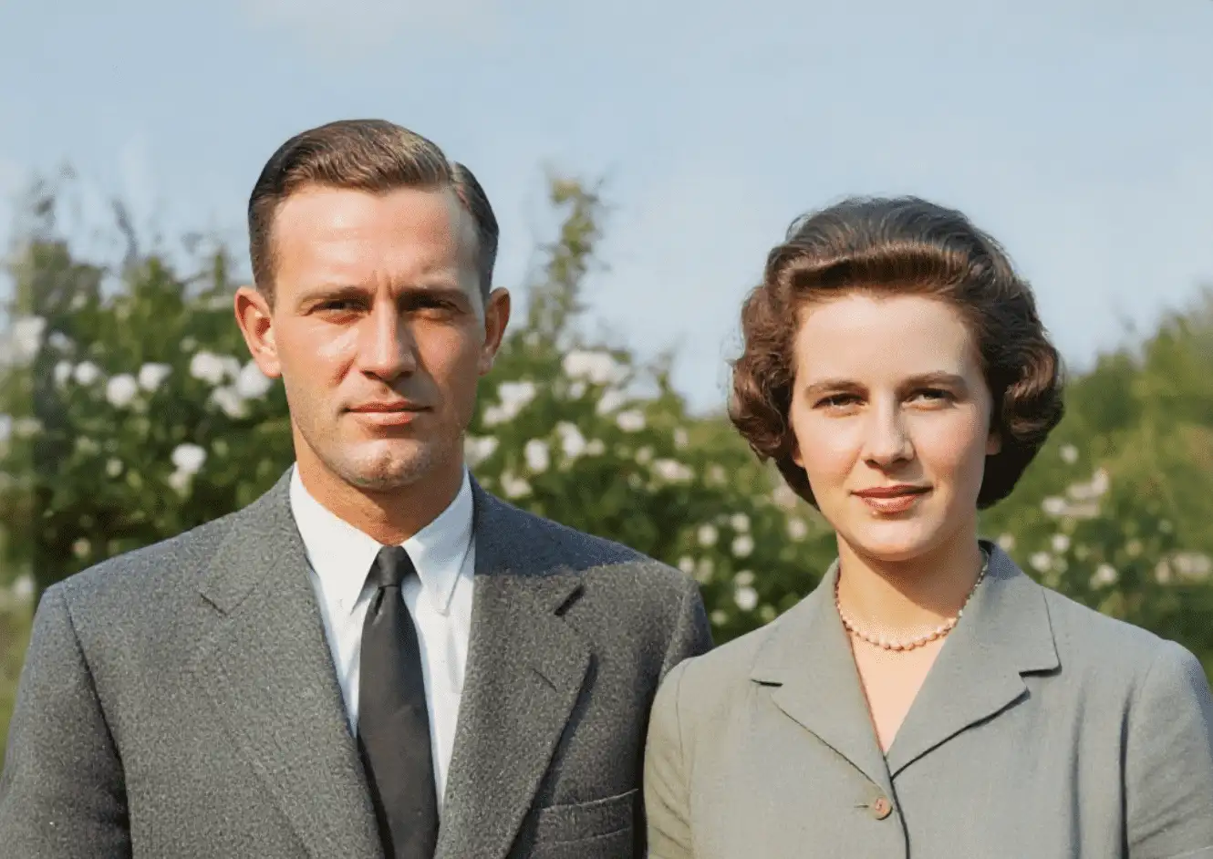 The same portrait of the couple restored, with the cracks and missing patches repaired